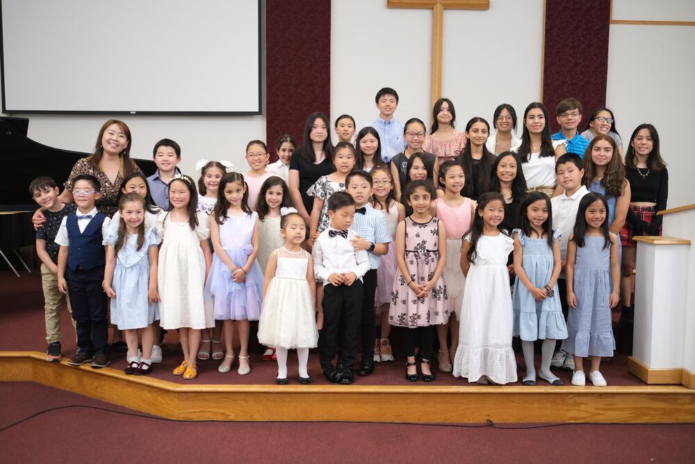 Students performing at a Yoonjoo Music recital in Cherry Hill, NJ
