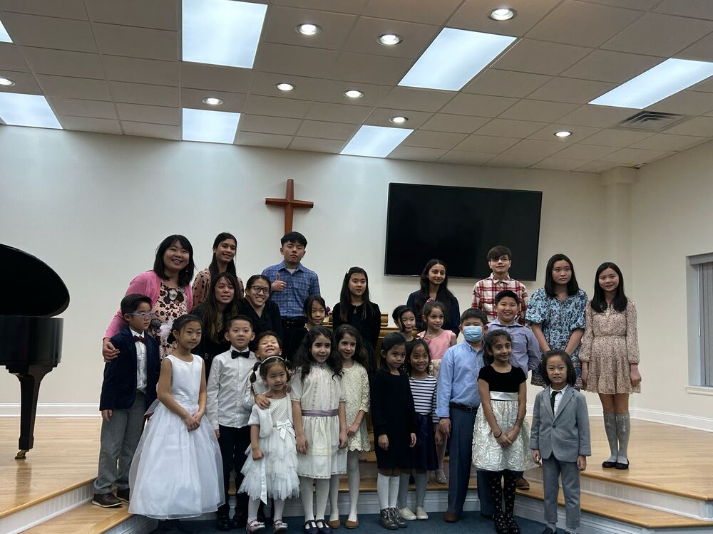 Students performing at a Yoonjoo Music recital in Cherry Hill, NJ