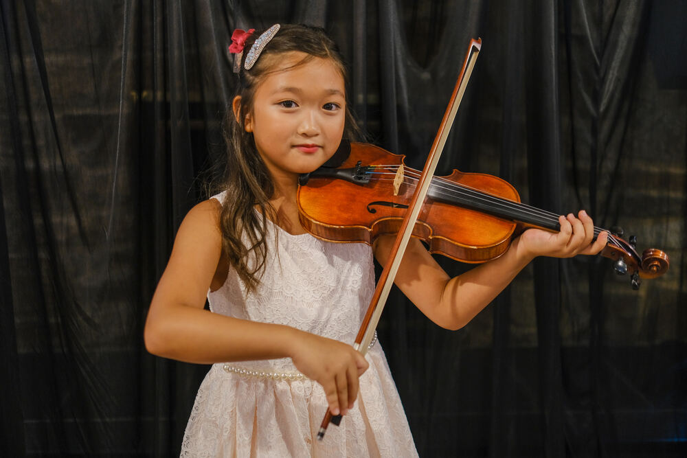 Students performing at a Yoonjoo Music recital in Cherry Hill, NJ