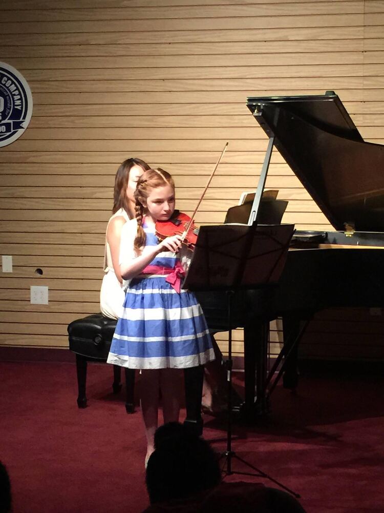 Students performing at a Yoonjoo Music recital in Cherry Hill, NJ